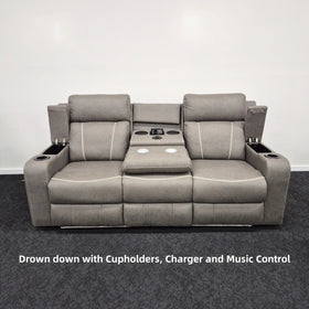 Grey 3 seater electric recliner lounge with storage, cupholders, charger, and music control