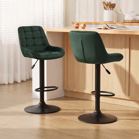 Cairo Bar Stools in green velvet with grid-quilted backrests and matte black gas lift bases at a timber kitchen bench
