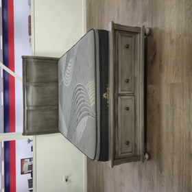 Canada Bed Frame in grey on The A2Z Furniture showroom floor, footboard and matching nightstand viewed from the foot of the bed.