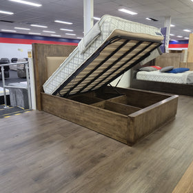 Close-up of the Cannon Gas Lift Bed Frame's footboard and slatted timber panel detail in walnut finish — The A2Z Furniture showroom.