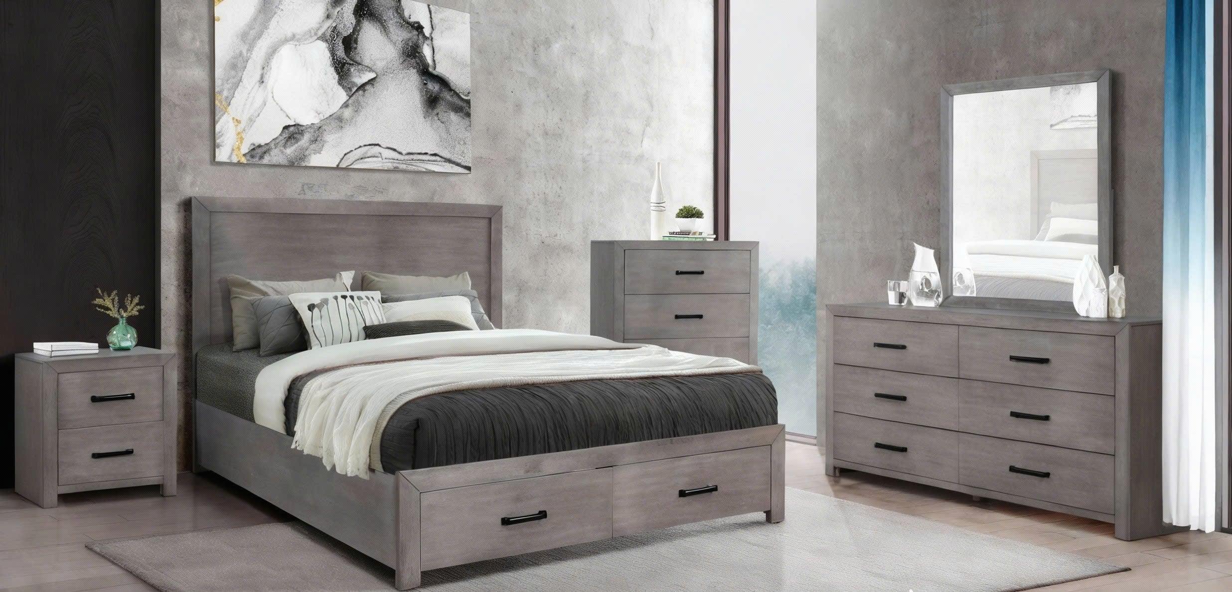 Gray bedroom furniture set with bed, dresser, and nightstands in a room.