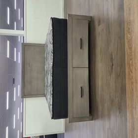 Canyon Bed Frame in grey on The A2Z Furniture showroom floor, headboard and matching two-door bedside cabinet with black handles.