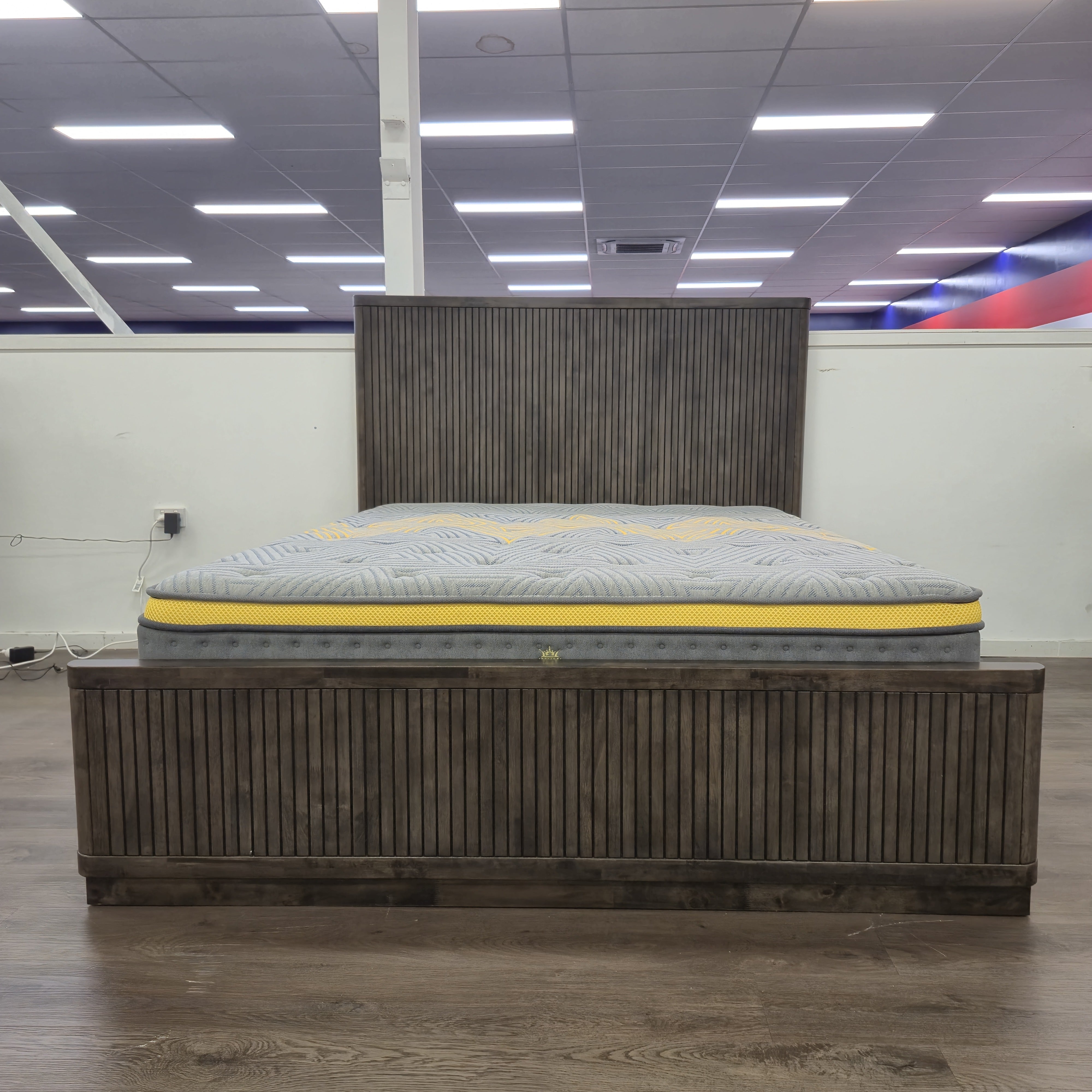 Cape Town Bed Frame front elevation in dark grey slatted timber, shown on display in The A2Z Furniture showroom (mattress shown not included)
