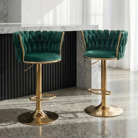 Casablanca Bar Stools in green velvet with woven backrests and gold gas lift bases at a stone bar
