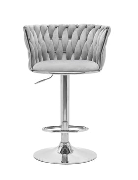 Gray tufted bar stool with a chrome base on a white background