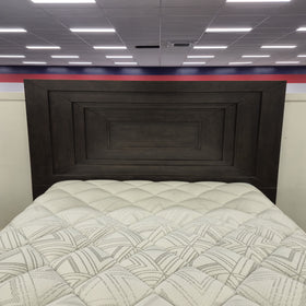 Headboard of the Chandler Floating Bed Frame in a dark espresso timber finish, with stepped mitred panel framing and a reeded centre inset, in The A2Z Furniture showroom. Mattress shown is not included.