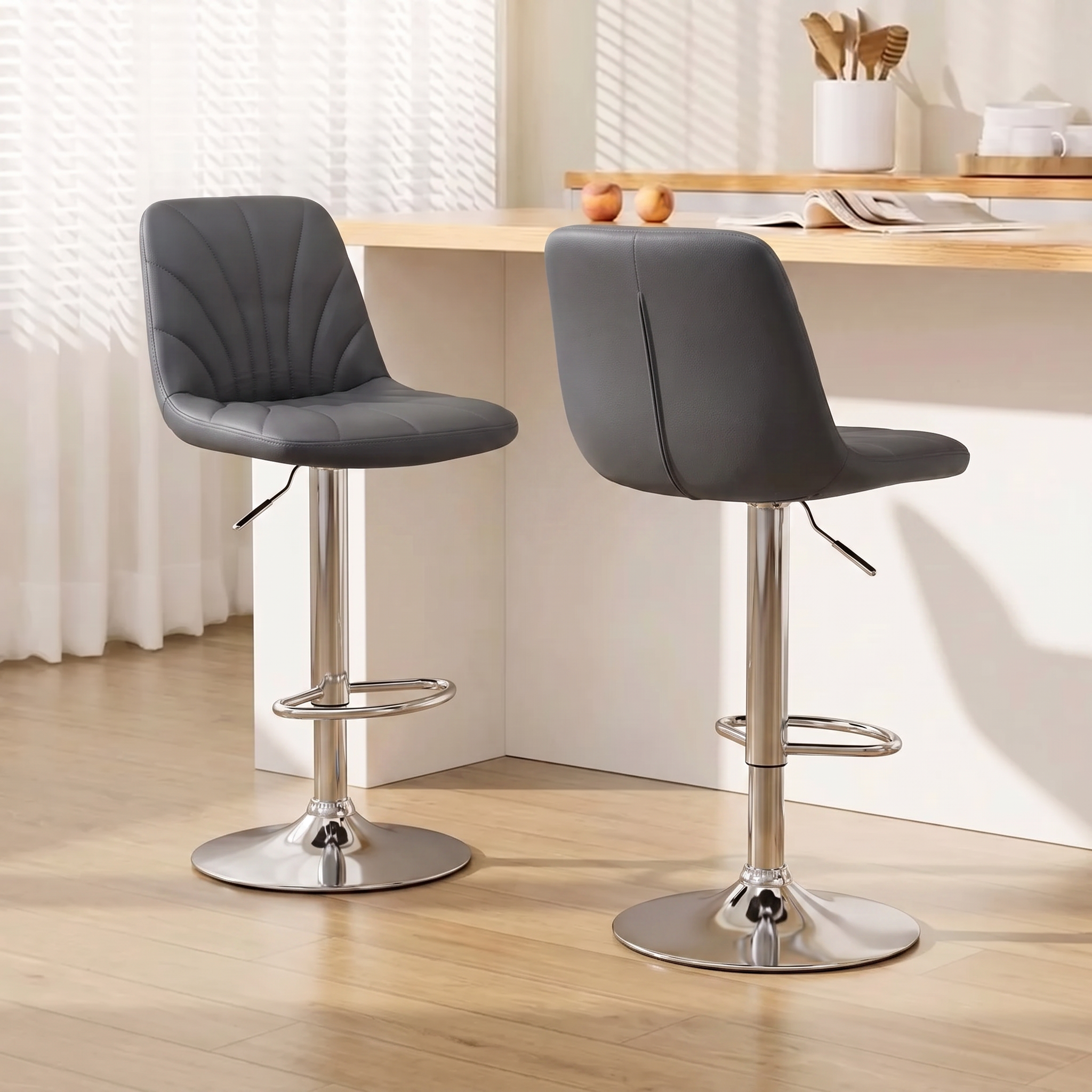 Chroma Bar Stools in grey PU leather with fan-stitched backs and polished chrome bases at a kitchen bench