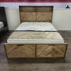 Cleveland Bookcase Bed Frame in a light natural timber finish viewed from the foot of the bed in The A2Z Furniture showroom. Mattress shown is not included.