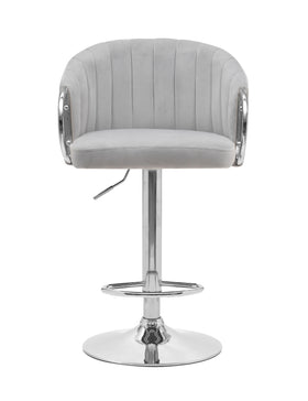 Modern grey velvet bar stool with chrome base and footrest, curved backrest design