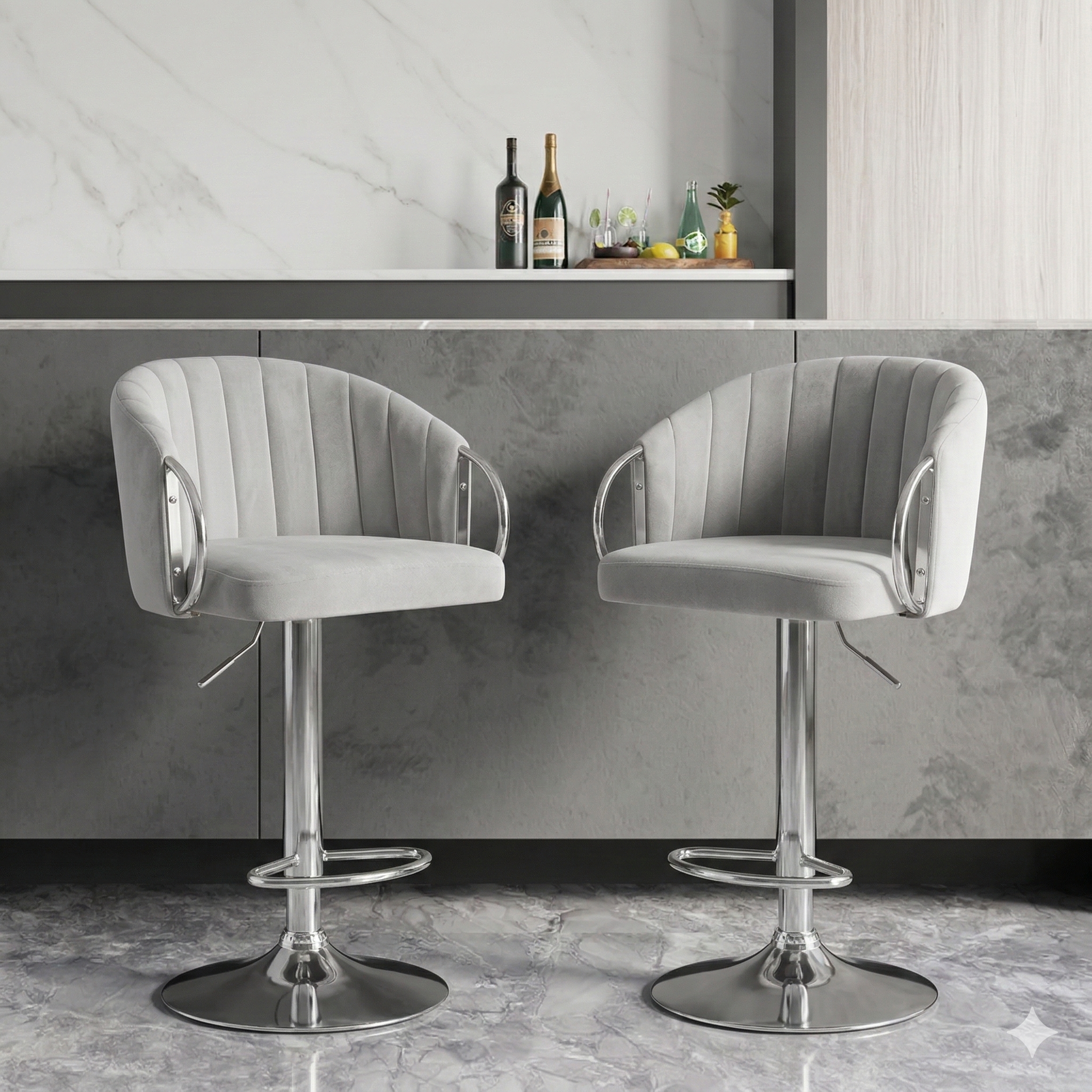 Two gray bar stools with chrome bases in a kitchen setting.