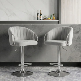 Columbia Bar Stools in grey velvet with channel-stitched backrests and chrome gas lift bases at a home bar