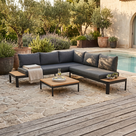 Portals Outdoor Corner Lounge with matching Bendigo timber-top square coffee table and charcoal cushions on a sunny poolside patio - The A2Z Furniture