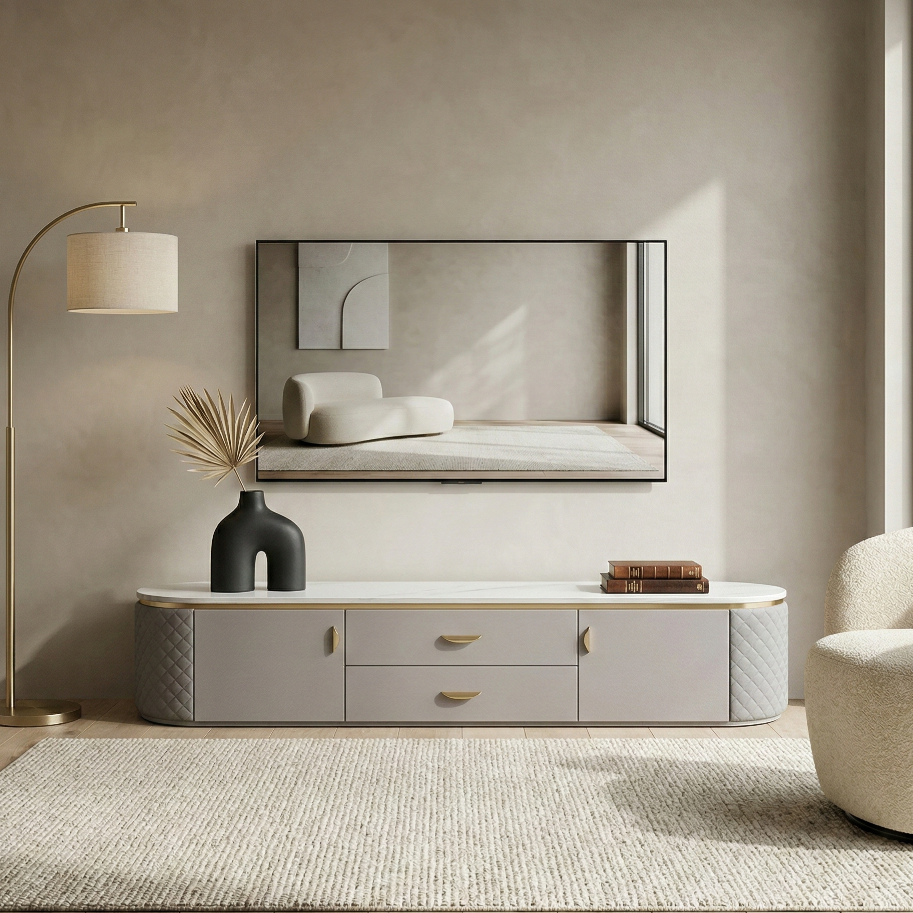 Modern living room with a TV console, floor lamp, and armchair.