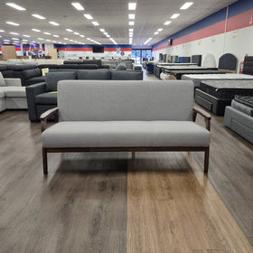 Donald 3 Seater Fabric Sofa in light grey with a dark timber frame and open timber armrests, photographed front-on in The A2Z Furniture showroom