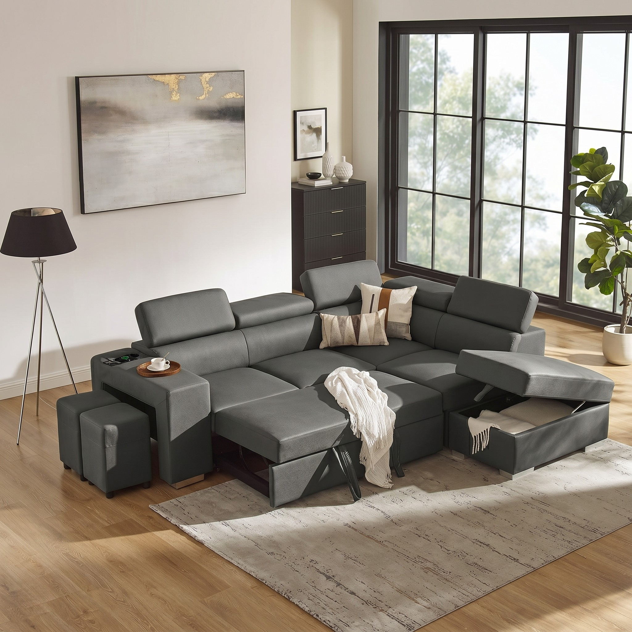 Gray sectional sofa bed  in a living room with a rug, lamp, and window.