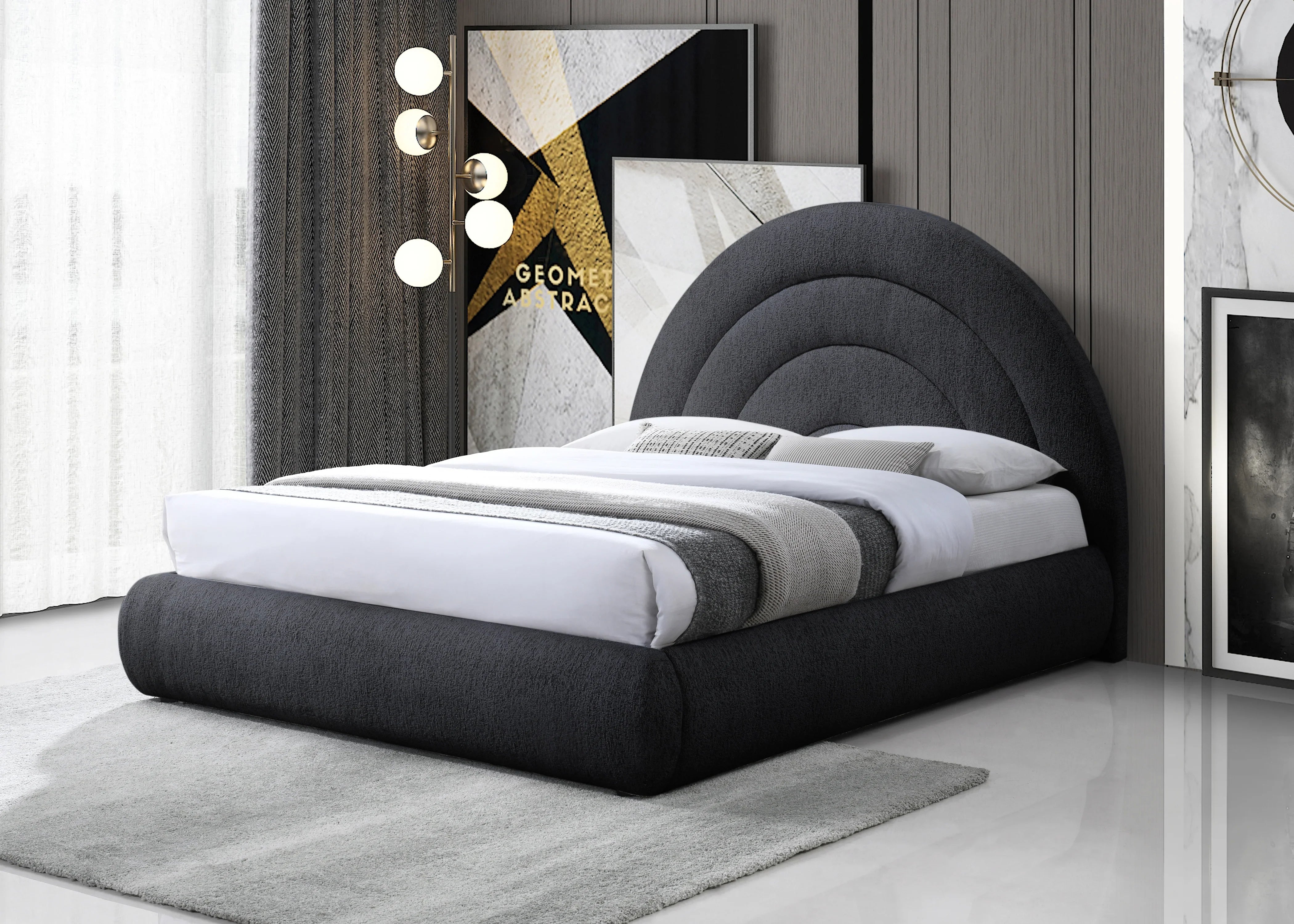 Modern grey upholstered bed with an arched headboard in a stylish bedroom setting