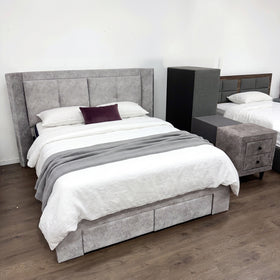 Forest storage bed frame in Light Grey with winged headboard, styled in our showroom