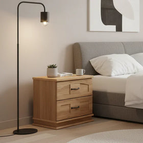 Modern bedroom with a bed, nightstands, and floor lamp.