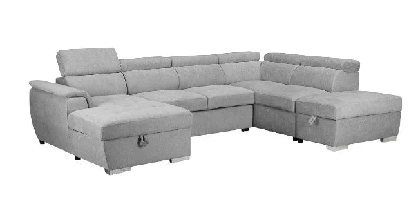 Grey sectional sofa with storage ottoman on a white background