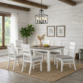 Homestead 7 Piece Dining Set — 190 cm distressed acacia table with a white painted base and six grey upholstered ladder-back chairs, styled in a dining room