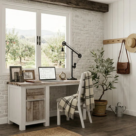 Home office with a desk, chair, and decor elements.