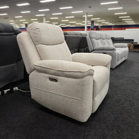 Hudson Electric Recliner Chair in cream textured woven fabric, partly reclined with the electric control buttons visible on the outside of the arm, at The A2Z Furniture showroom