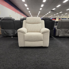 Hudson Electric Recliner Chair in cream textured woven fabric, close front view of the seat and stitched footrest panel, at The A2Z Furniture showroom