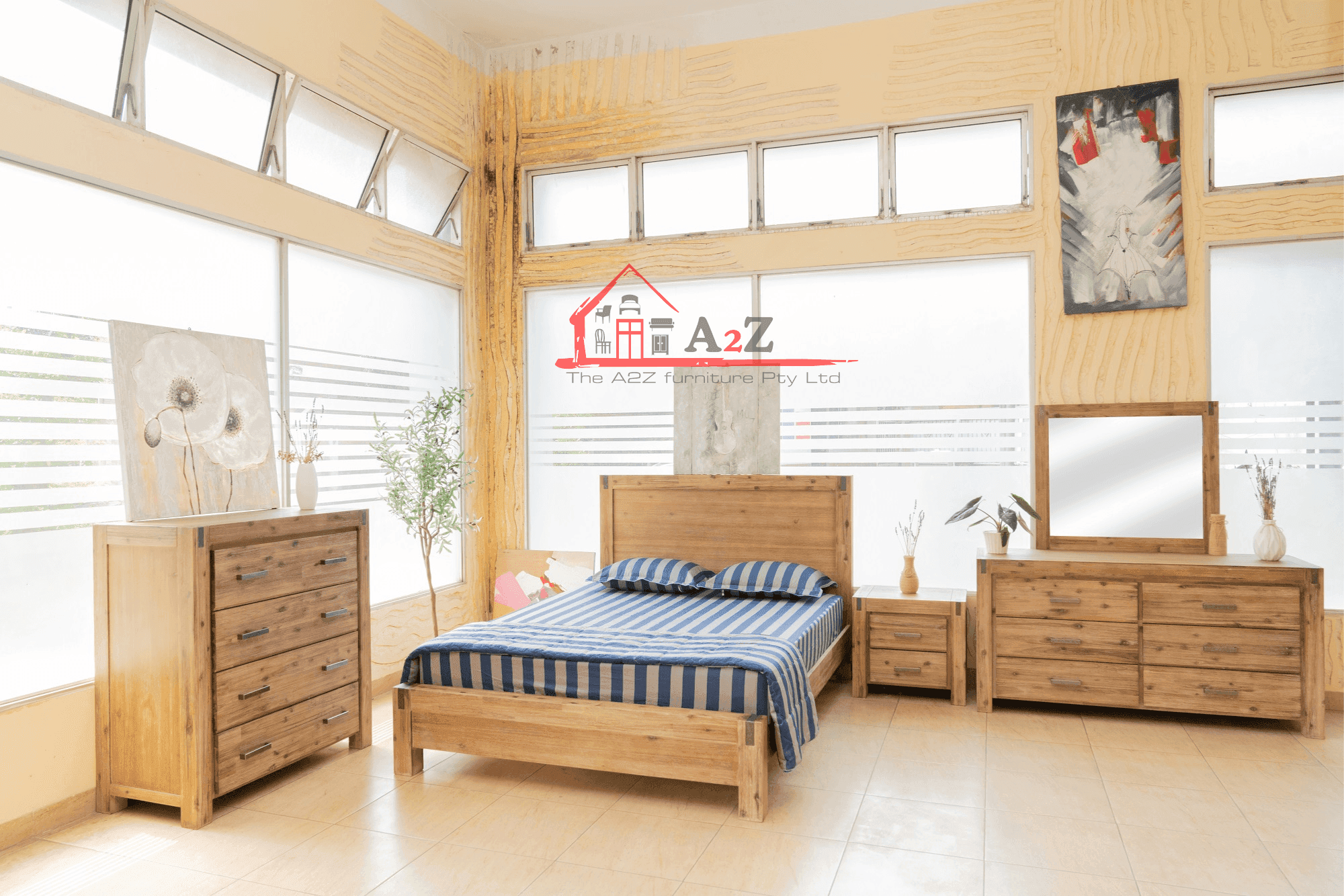 Modern bedroom with wooden bed frame, striped bedding, dresser, nightstands, and large windows