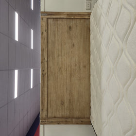 Close-up of Jayden bed frame footboard panel and mattress edge, mattress not included