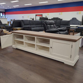 Jericho TV Unit - Coastal Hamptons Style Entertainment Console made of solid acacia wood with 2 cabinet style doors on the sides and 4 open shelves.