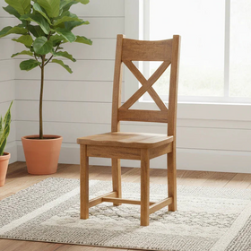 Wooden chair in a room with plants and a window
