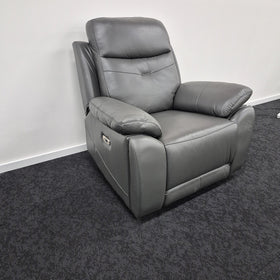 Lalor Electric Leather Recliner Chair in dark grey leather, three-quarter view in the upright position with the arm control panel visible, at The A2Z Furniture showroom.