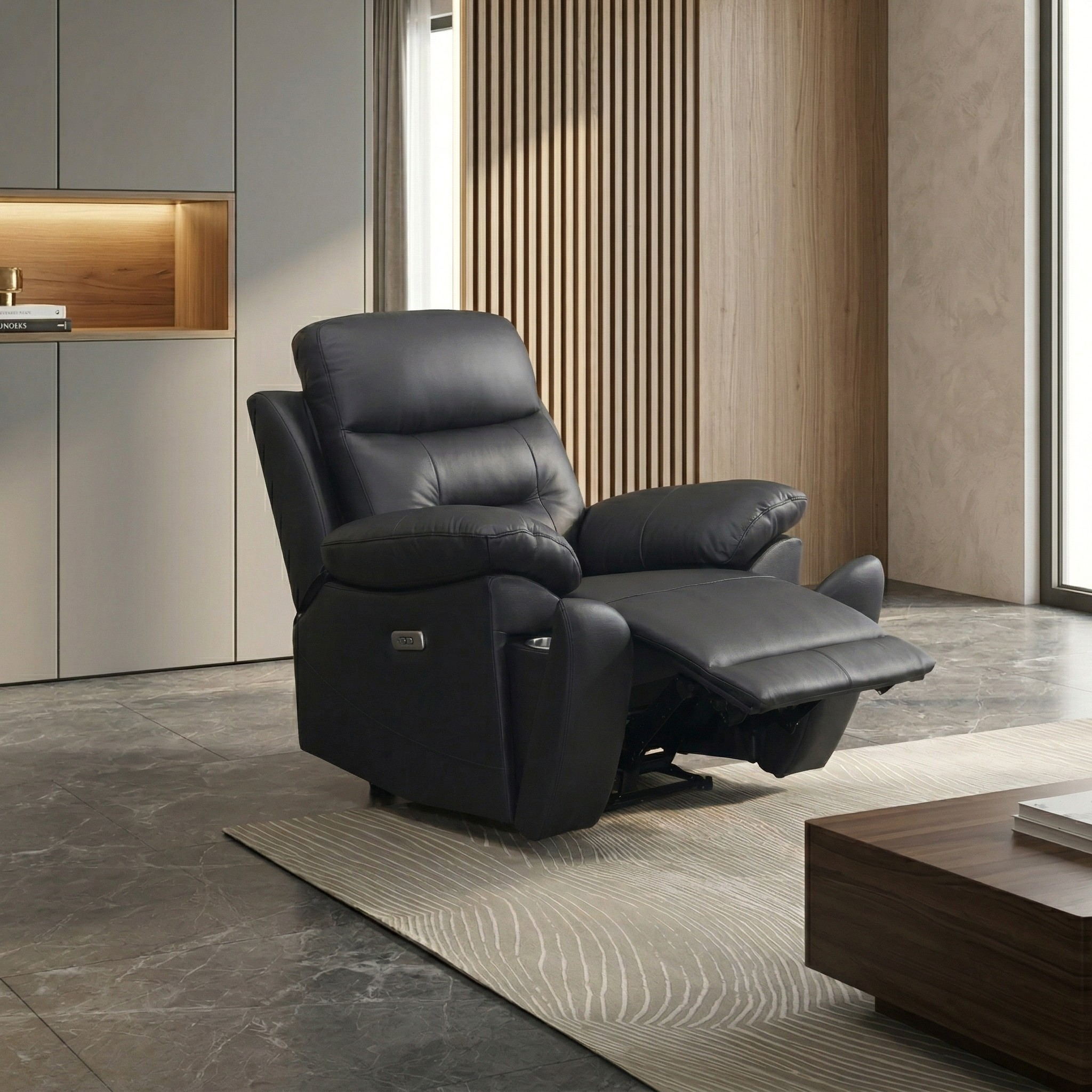 Legend Leather Recliner Chair in black leather, shown fully reclined in a modern living room with marble flooring and wooden accents.