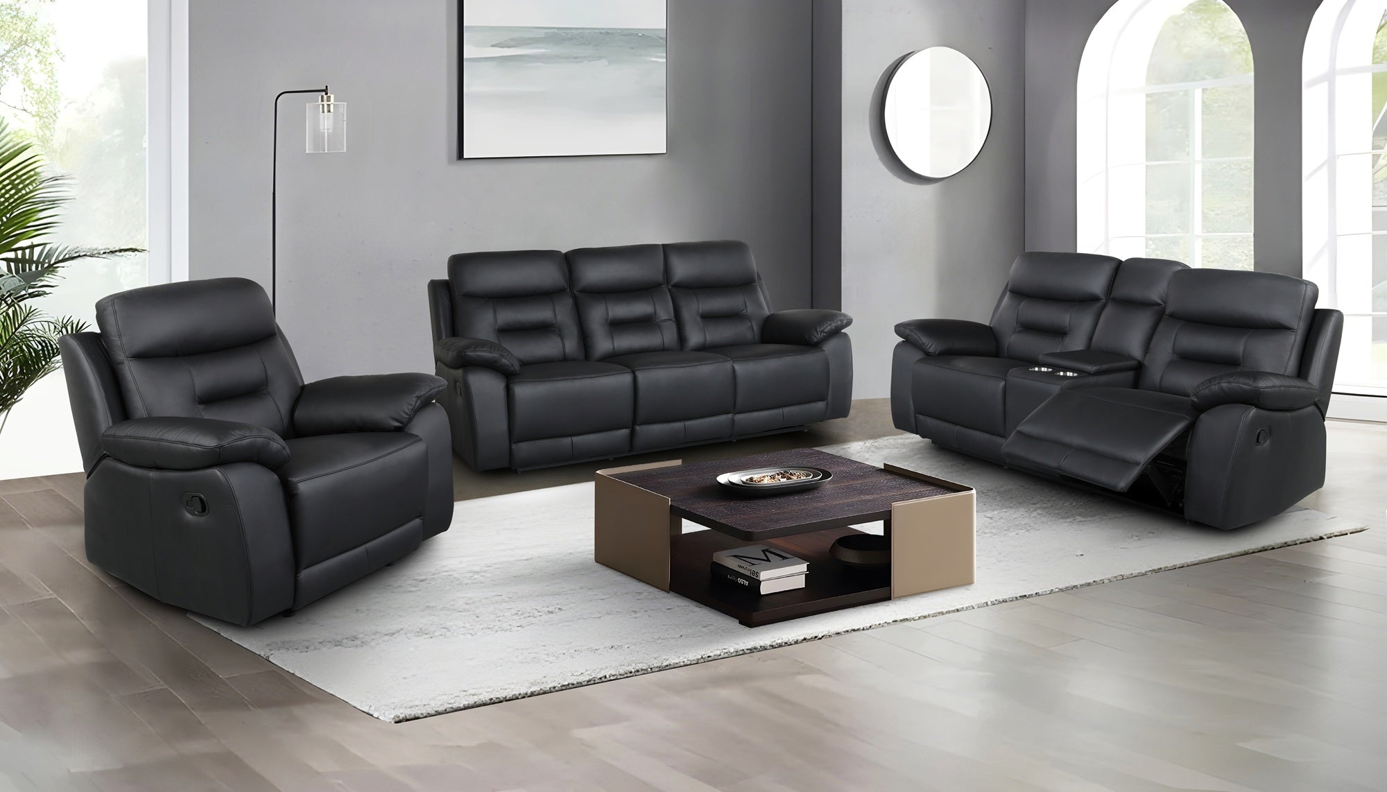 Black genuine leather recliner sofa set in a modern living room with a coffee table.