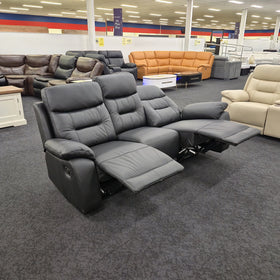 Lemington 3 Seater Leather Recliner Lounge in black leather, angled view with both end seats reclined showing the extended footrests and recliner mechanism, in The A2Z Furniture showroom