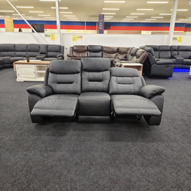 Lemington 3 Seater Leather Recliner Lounge in black leather with both end seats reclined and footrests extended, fixed middle seat upright, in The A2Z Furniture showroom