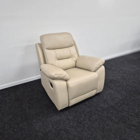 Beige leather recliner chair with plush cushions in a modern lounge setting
