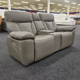 Limestone 2 Seater Electric Leather Recliner Lounge angled view showing the two seats, centre console with cupholders and side recline control, on display in The A2Z Furniture showroom
