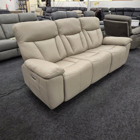 Limestone 3 Seater Electric Leather Recliner Lounge angled view showing the three seats, pillow-top arms and side recline control, on display in The A2Z Furniture showroom