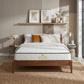 Bedroom with a wooden bed, white mattress, and decorative elements.