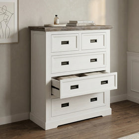 White dresser with multiple drawers in a room setting