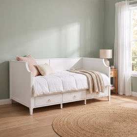 Mariana 3 Drawer Daybed in white styled in a kids bedroom