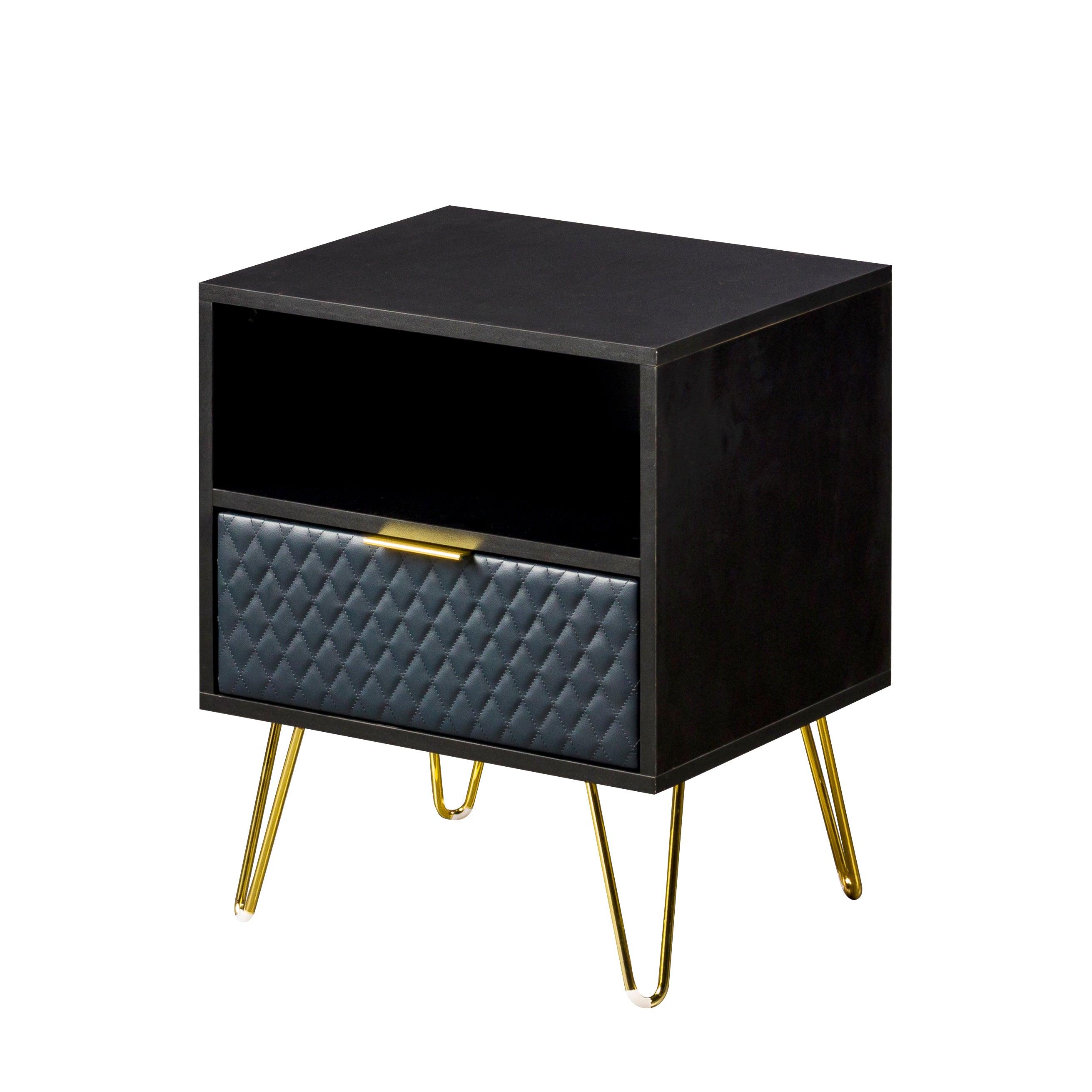 Black bedside table with quilted drawer, open shelf, and gold metal legs