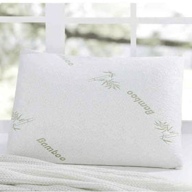 Mellow Pillow Bamboo Memory Foam Pillow with soft, breathable bamboo fabric cover placed on a white textured blanket in front of a bright window.