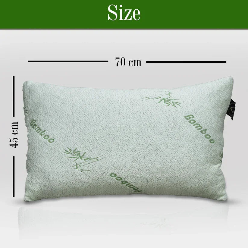 Green pillow with 'Bamboo' text and measurements on a white background