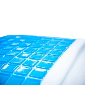 Blue square patterned mat on a white surface