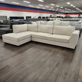 Melton 3 Seater Chaise Lounge in Galaxy Natural on display in The A2Z Furniture showroom, front three-quarter view with the chaise on the left when sitting.