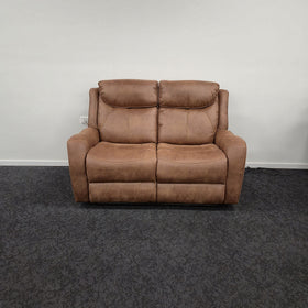 Milano 2 Seater Recliner Lounge in brown fabric, front view of the two seat cushions and pillow-top headrests, on display in The A2Z Furniture showroom