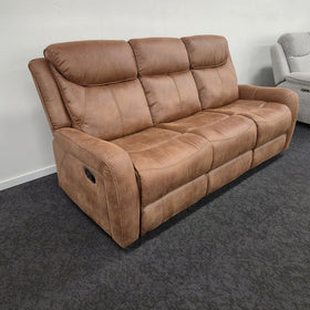 Milano 3 Seater Recliner Lounge in brown fabric, angled view showing the manual recliner pull handle on the arm, on display in The A2Z Furniture showroom