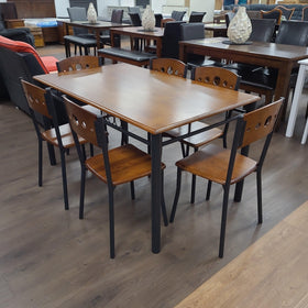 Mojito Dining Set — 7 piece set with a black metal framed table and six matching chairs, shown in the showroom